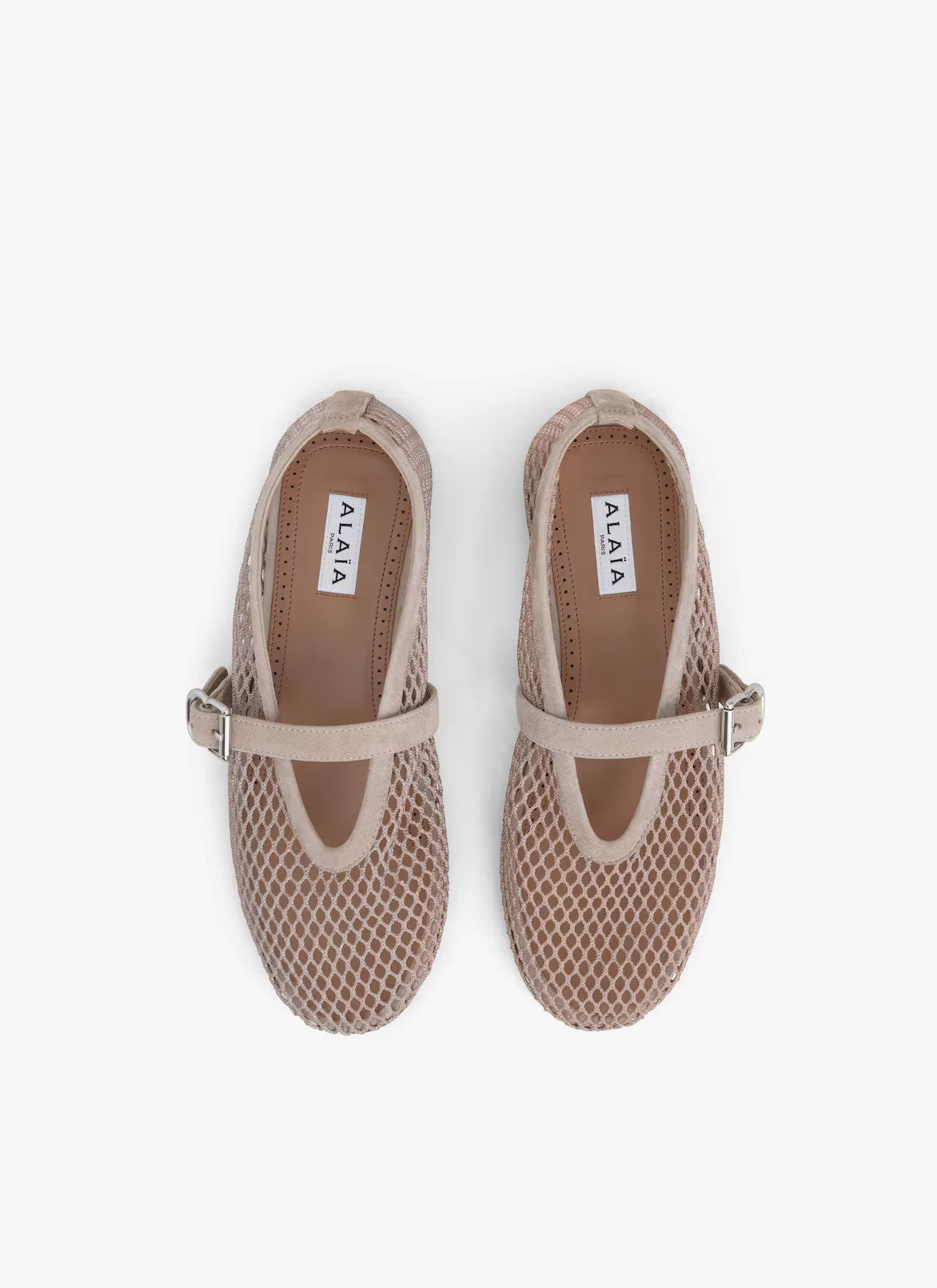 Overhead view of grey fishnet ballet flats on white background, with no model shown.