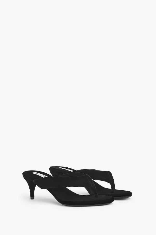 Alternate pair view of noir heel thong mule in velvet on white background, with no model shown.