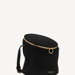 Side slanted view of noir la canette small bag on white background, with no model shown.