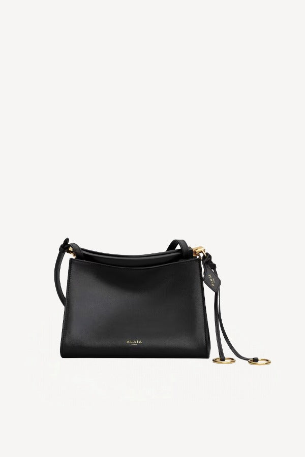 Front view of noir le click small square bag on white background, with no model shown.