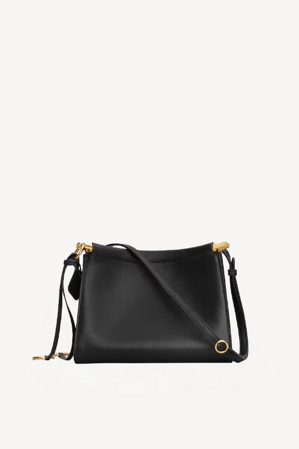 Back view of noir le click small square bag on white background, with no model shown.
