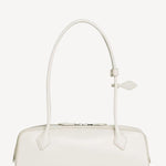 Back view of ivoire le teckel medium bag on white background, with no model shown.