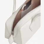 Zipper open bag view of ivoire le teckel medium bag on white background, with no model shown.