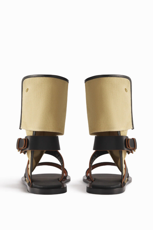 Back view of ecru gladiator wrap sandal on white background, with no model shown.