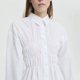 Front closeup view of braxton shirt on model against a white background.