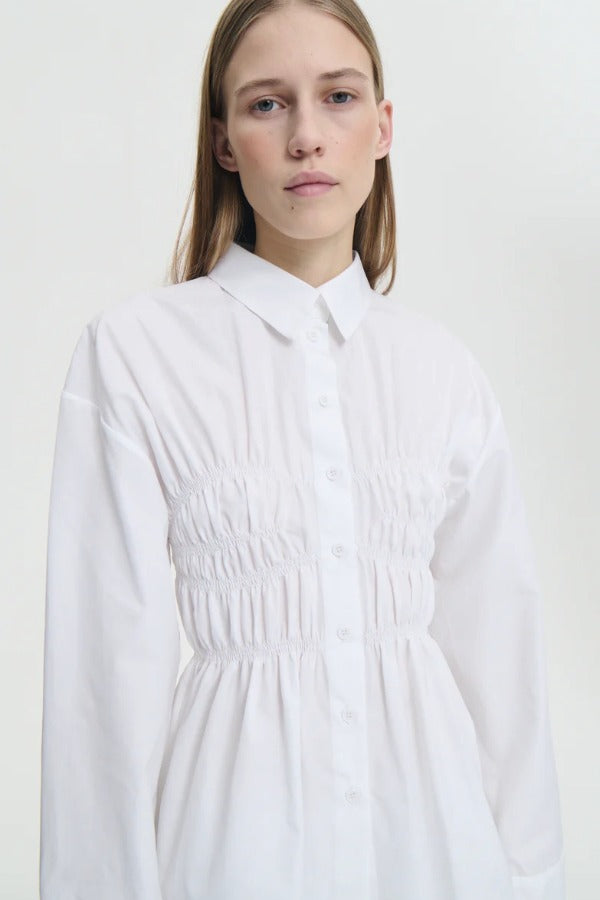 Front closeup view of braxton shirt on model against a white background.