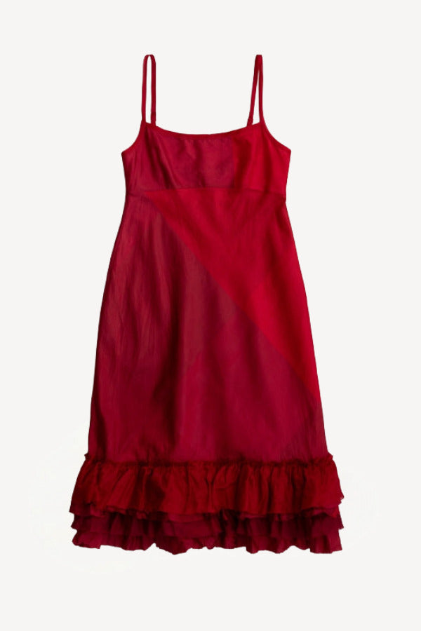 Front view of lipstick slip with ruffles on white background, with no model shown.