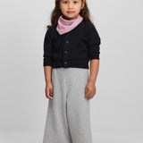 Front view of raven no 440 toddler cardigan on model wearing grey pants, against a white background.