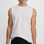 Front view of snow player top on model wearing black pants, against white background.