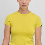 Front view of sunny america top on black haired model wearing grey pants, against white background