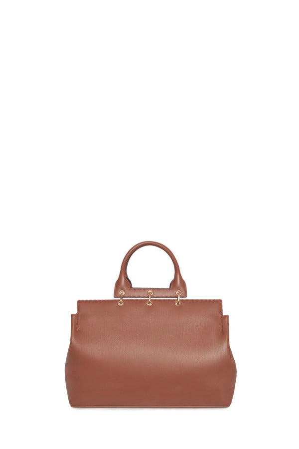 Front view of cognac amethyst tote on white background, with no model shown.