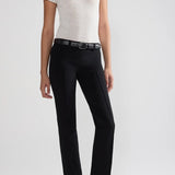 Front view of black tuxedo julep pant on model wearing white t-shirt and flats, against a white background.