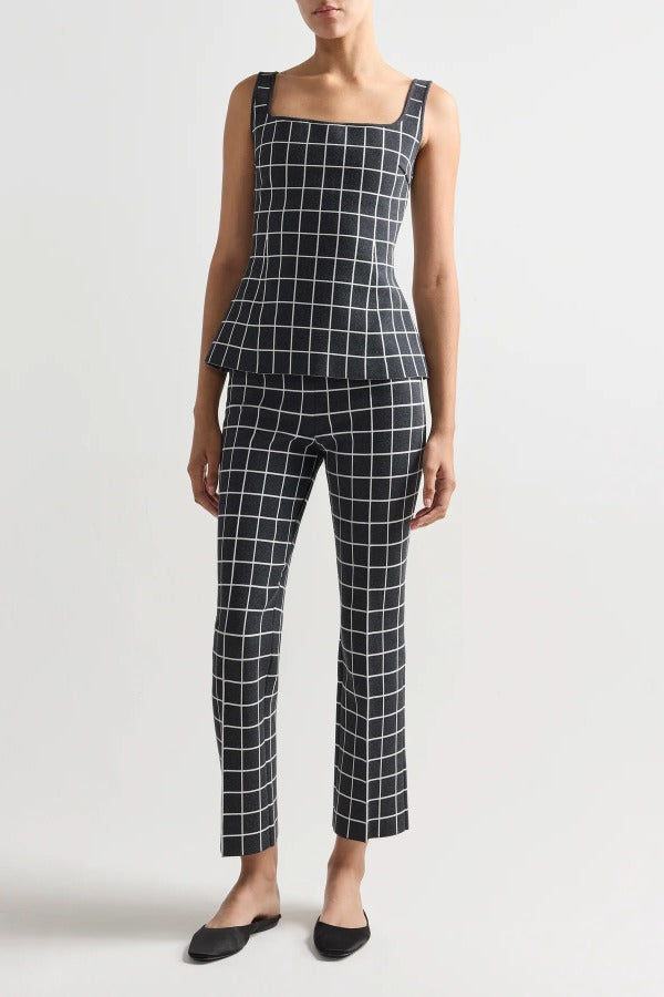 Alternate front view of charcoal combo inna top on model wearing charcoal combo louis pants and flats, against a white background.