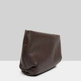 Side view of morro fanta shoulder bag on white background, with no model shown.