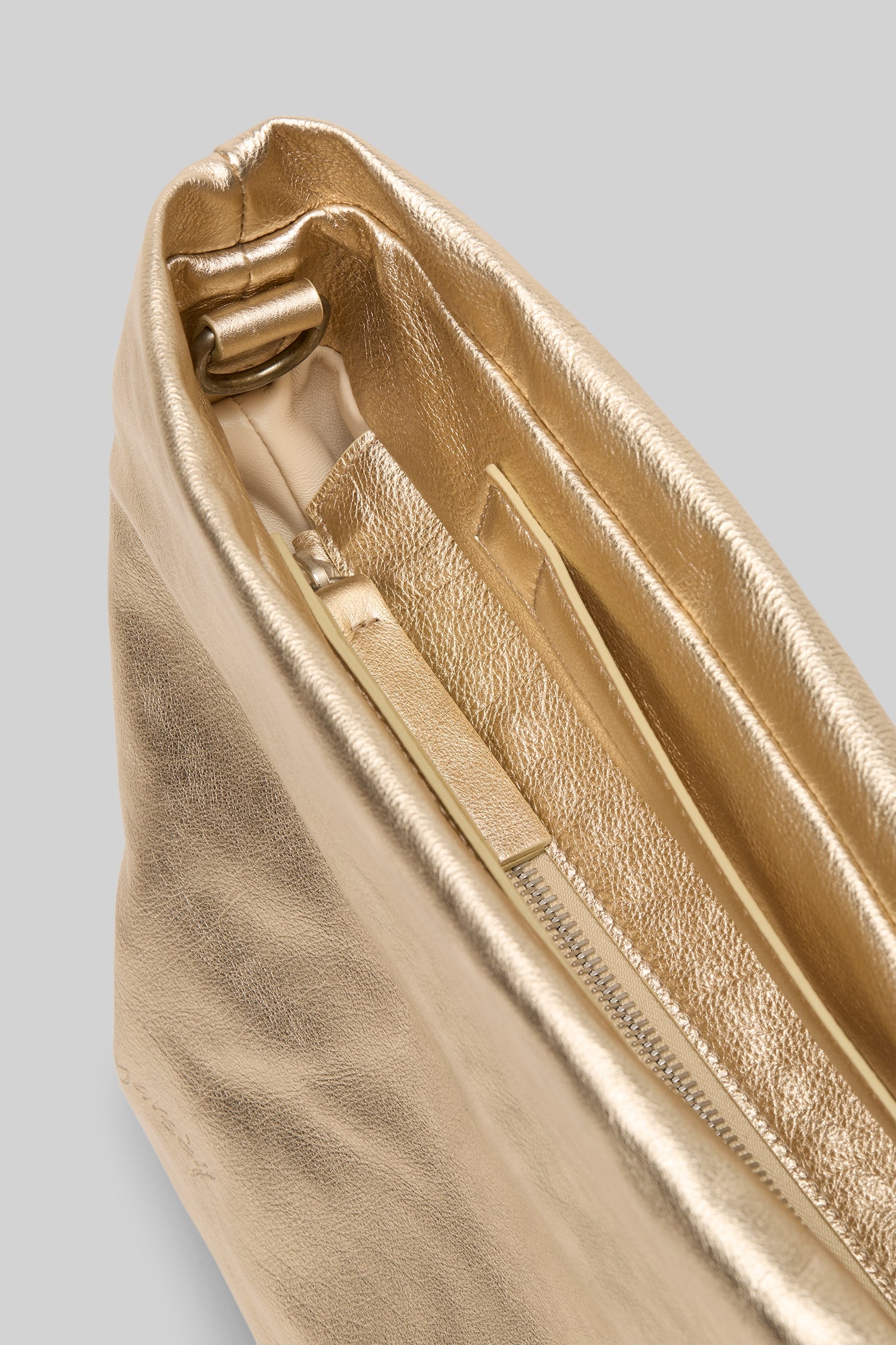 Zipper view of platino fanta shoulder bag on white background, with no model shown.
