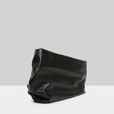 Side view of nero fanta shoulder bag on white background, with no model shown.