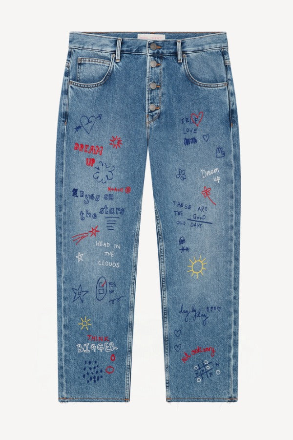 Front view of denim embroidered scribble jean on white background, with no model shown.