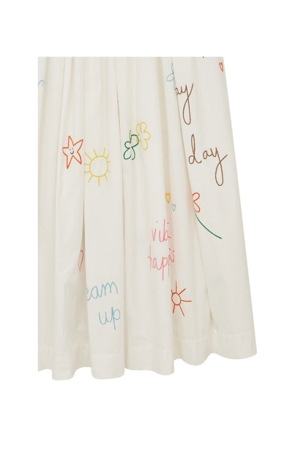 Front closeup view of embroidered scribble skirt against white background, with no model shown.