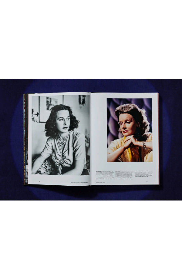 Open view of taschen hollywood book on blue background.