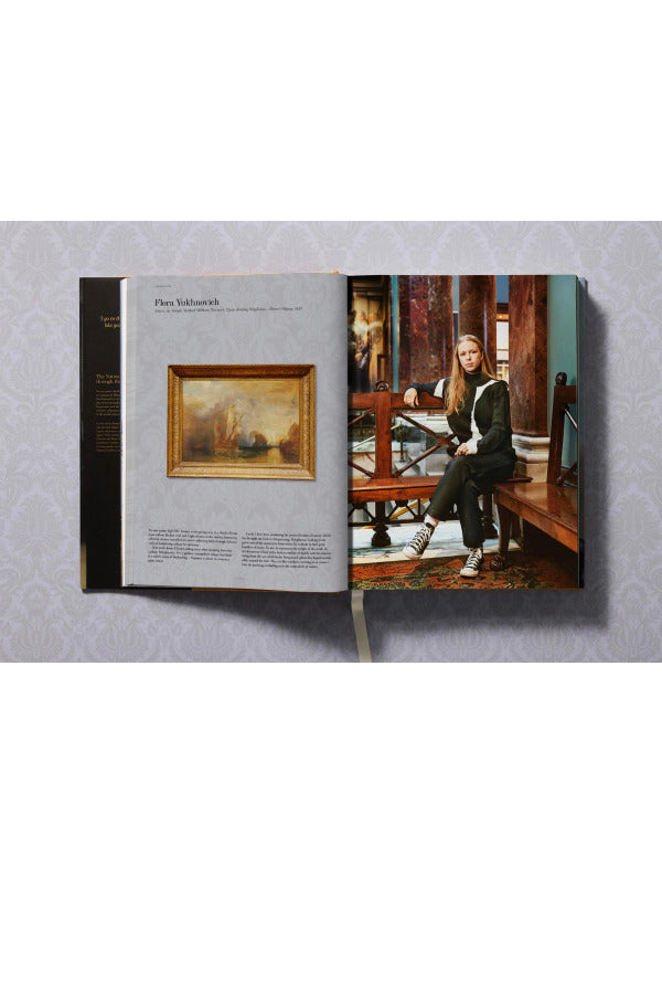 Open view of taschen national gallery paintings, people book on light colored tablecloth.
