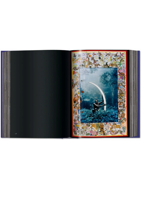 Open view of taschen peter beard book on white background.