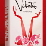 Front view of taschen Valentino book on red background.