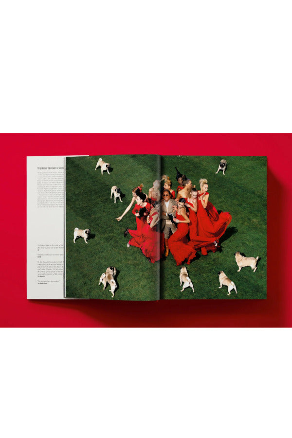 Open book view of taschen valentino book on red background.