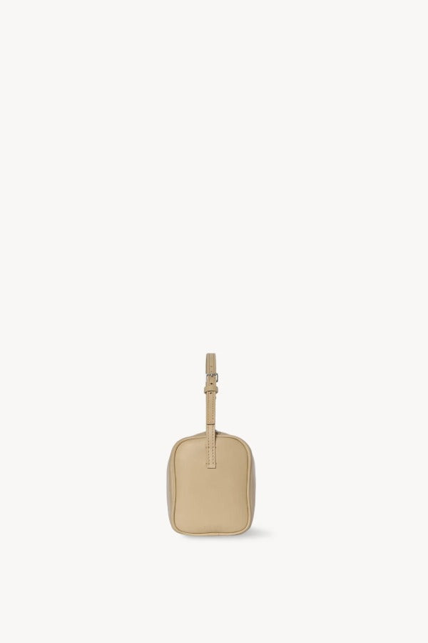 Side view of sand 90's bag on white background, with no model shown.