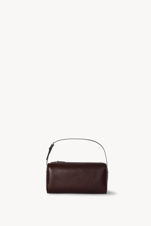 Front view of burgundy 90's bag on white background, with no model shown.