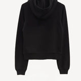 Back view of black timia sweatshirt top on white background, with no model shown.