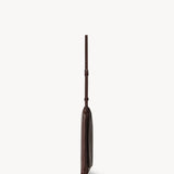 Side view of brown melange nan shoulder bag on white background, with no model shown.