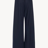 Back view of navy gala pant on white background, with no model shown.