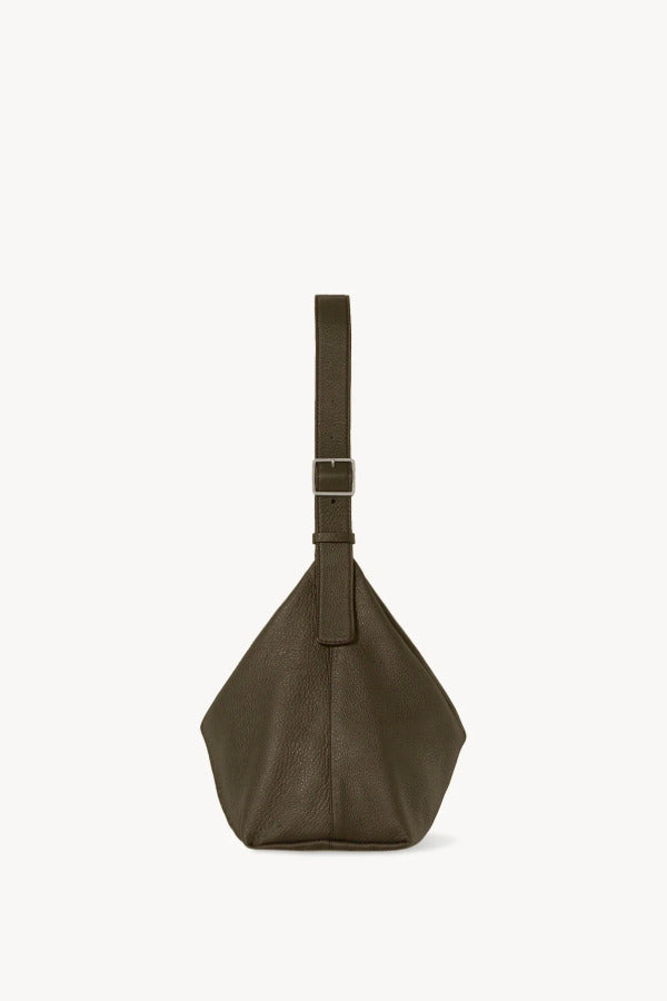 Side view of military olive isa shoulder bag on white background, with no model shown.