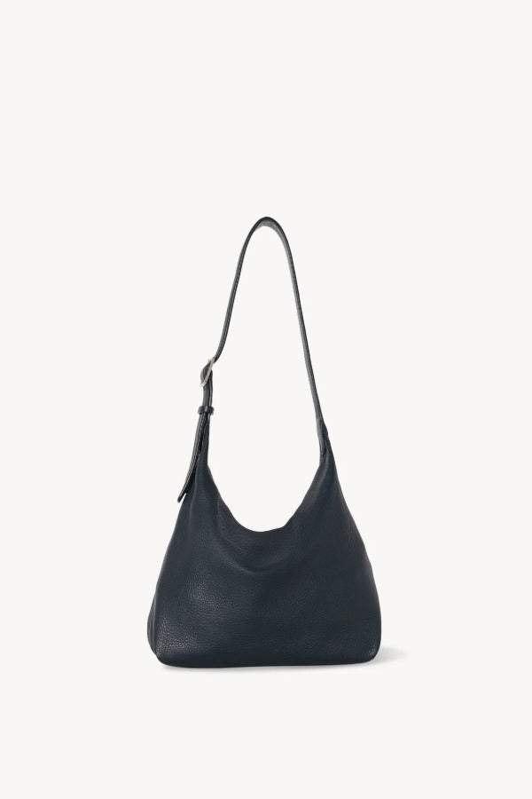 Front view of blu notte isa shoulder bag on white background, with no model shown.