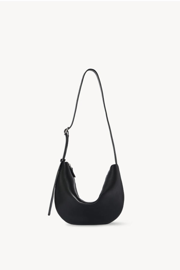 Front view of black jouvette bag on white background, with no model shown.