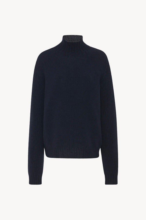Front view of dark navy kensington top on white background, with no model shown.