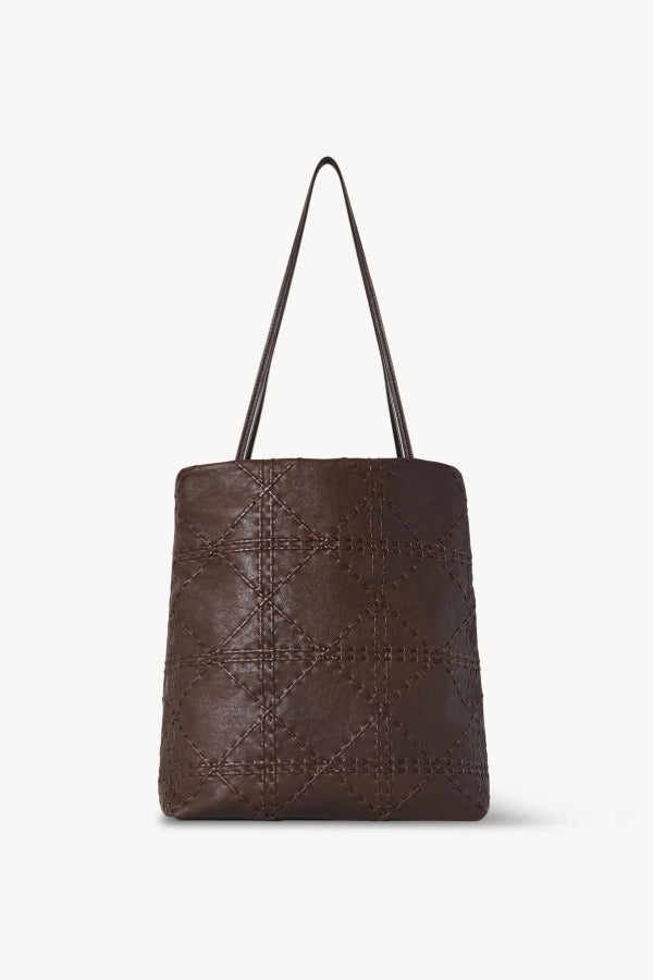 Front view of brown lilou woven tote on white background, with no model shown.