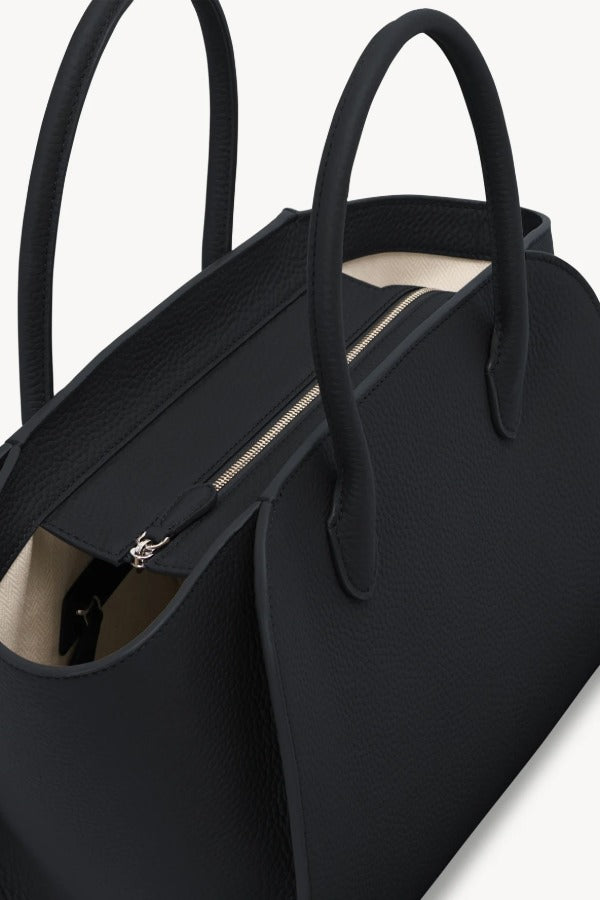 Zipper view of black marlo 12 bag on white background, with no model shown.
