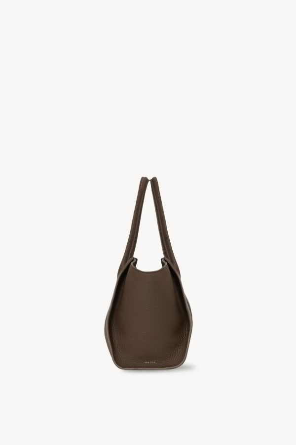 Side view of dark olive marlo 12 bag on white background, with no model shown.