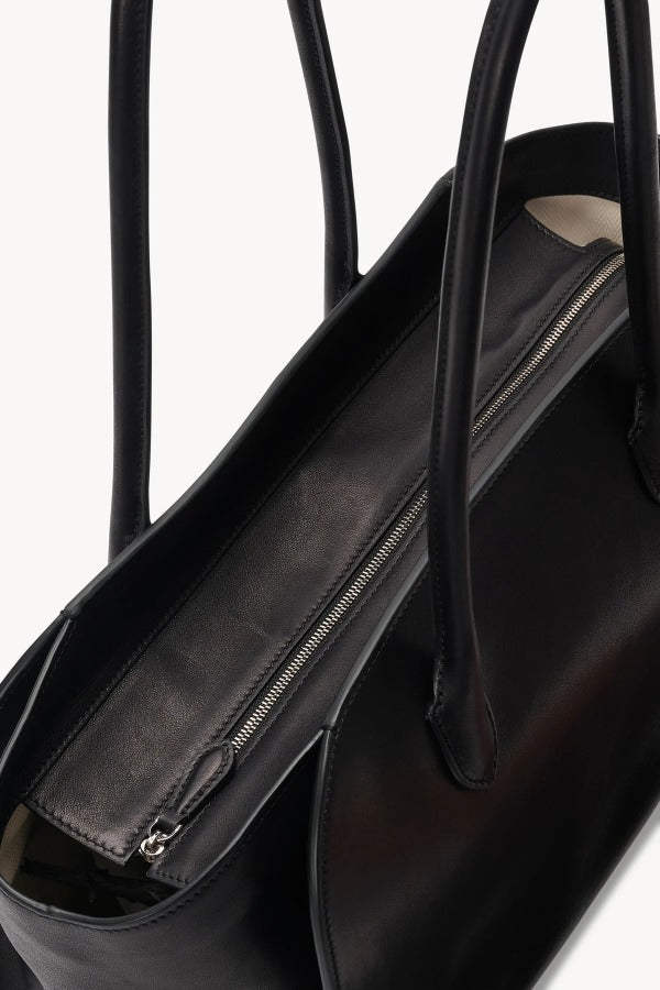 Zipper view of black marlo 14 bag on white background, with no model shown.