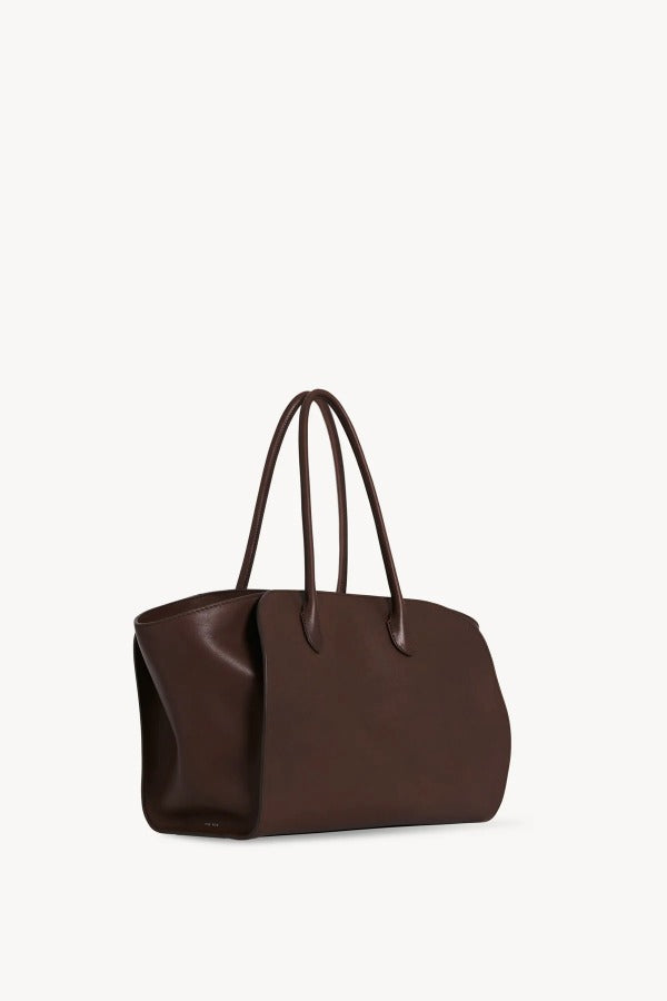 Front slanted view of deep brown marlo 14 bag on white background, with no model shown.
