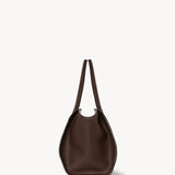 Side view of deep brown marlo 14 bag on white background, with no model shown.