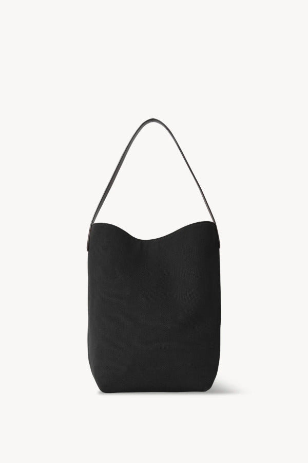 Back view of black medium n/s park tote on white background, with no model shown.