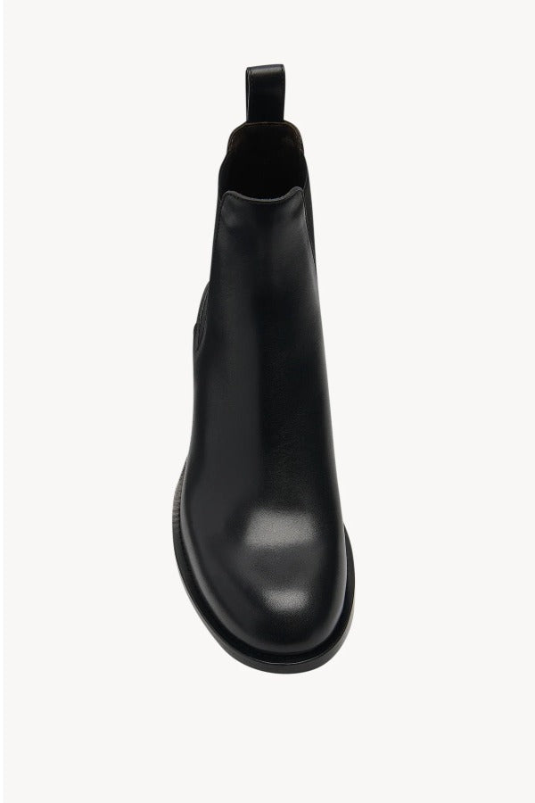 Overhead view of black nobilis boot on white background, with no model shown.