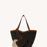 Back view of brown park tote three canvas on white background, with no model shown.