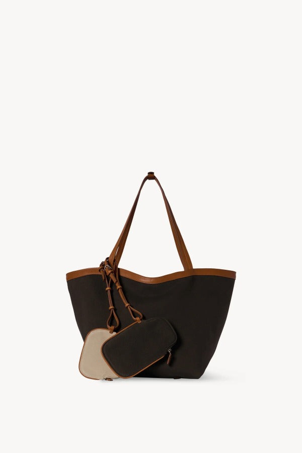 Back view of brown park tote three canvas on white background, with no model shown.