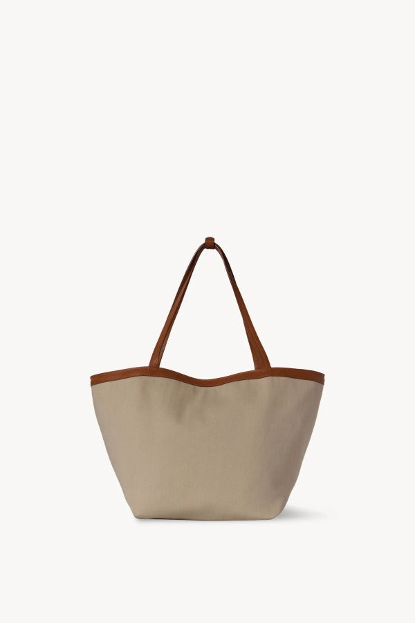 Reversible view of park tote three canvas on white background, with no model shown.