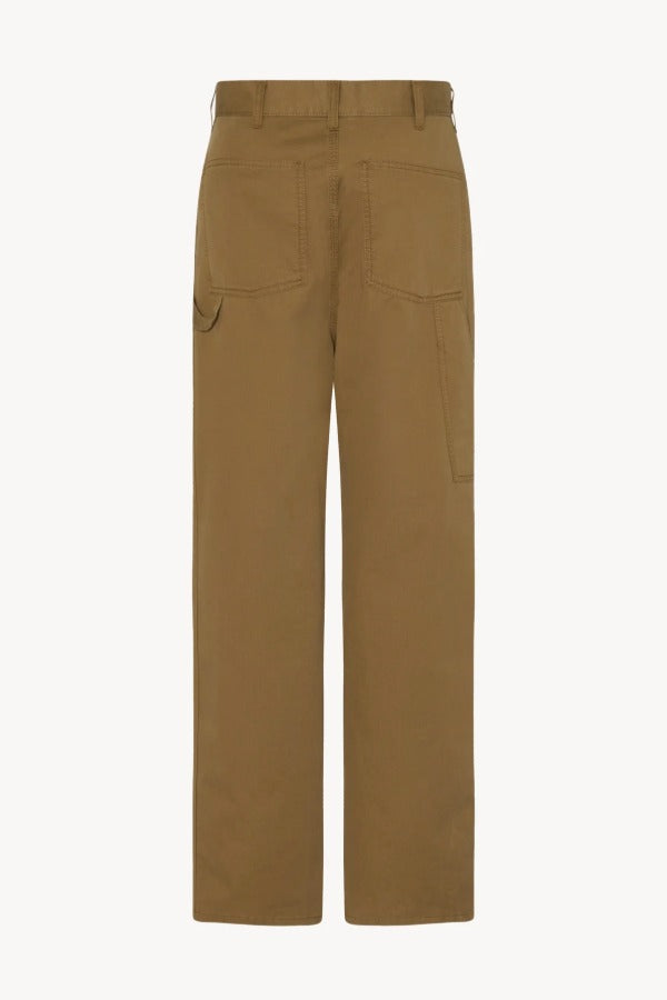 Back view of dark sand sharka pant on white background, with no model shown.