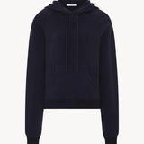 Front view of dark navy timia top on white background, with no model shown.