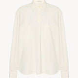 Front view of white erika shirt on white background, with no model shown.